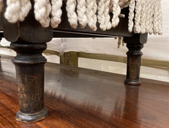 An oak framed fender stool, with cream brocade upholstery, width 110cm, depth 38cm, height 24cm